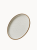 An oval ceramic platter in a matte off-white finish features a textured, wavy sand dune pattern on its interior and a natural brown rim.