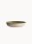 A shallow, round ceramic bowl with a speckled beige and light grey texture, on a plain white background.
