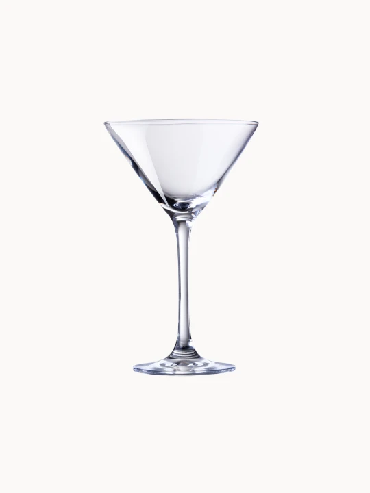 A classic, clear martini glass with a conical bowl resting on a slender stem.